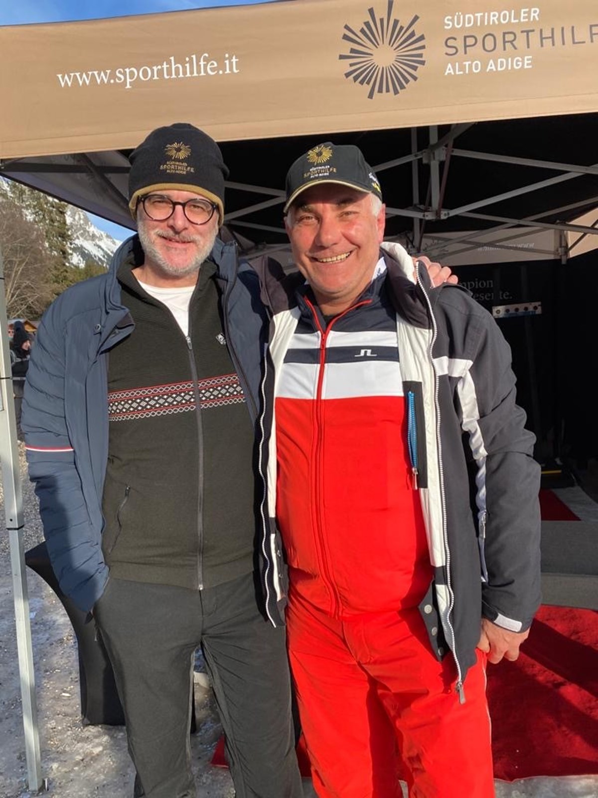 Dr. Alexander Gardetto mit Stefan Leitner am Sporthilfe Stand bei der Biathlon WM in Antholz